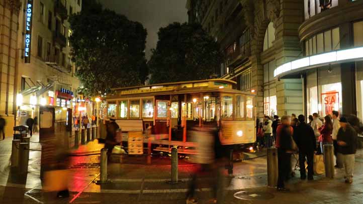 MUNI cable car on Main Street turntable at night